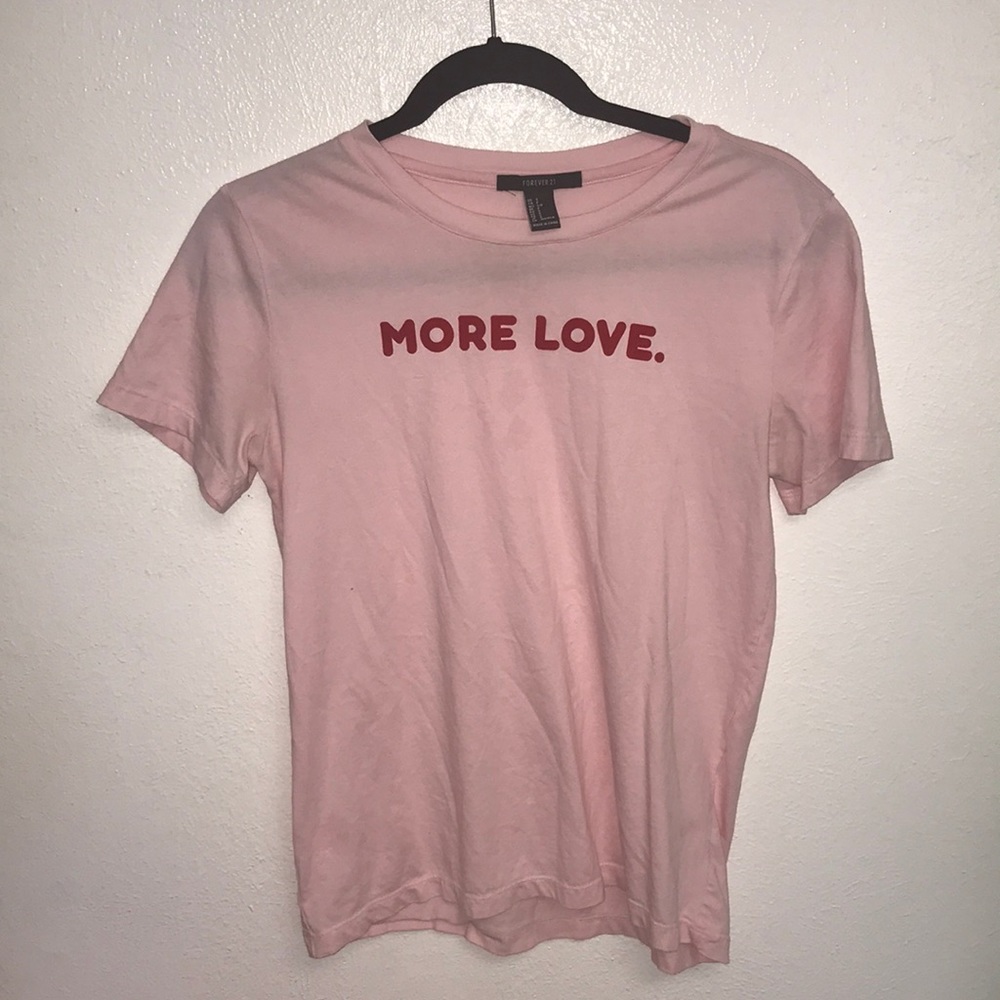 pink “more love.” t shirt